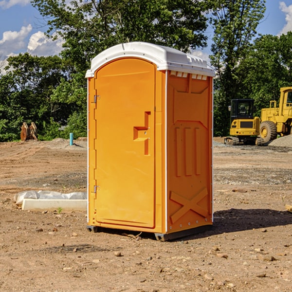 how often are the portable restrooms cleaned and serviced during a rental period in Lake City